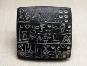 Tabuinha com escrita protocuneiforme de Uruk IV, ca. 3200 a.C.